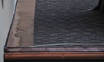 Heat Tape Slate Roofs: Prevent ice dams from forming on slate roofs where the wall meets the roof