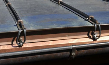 Heat Tape Metal Roofs: Heat cable is attached to metal roofs using HotEdge HotSeam to prevent ice dams on metal roofs