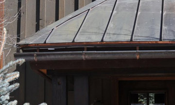 HotEdge heat tape melting snow on roof edge, no ice dams, HotEdge Rail Roof Ice Melt System