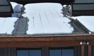 break up the snow and ice on a metal roof, deicing system for metal roofs