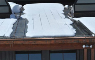 break up the snow and ice on a metal roof, deicing system for metal roofs