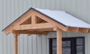 Dormer Door snow diverters, keeps falling snow and ice from barricading doorways